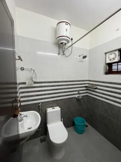 Bathroom detail at Beach Walk, with a water heater